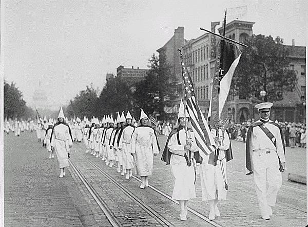 KKK members march down Pennsylvania Avenue in Washington D.C. in 1928