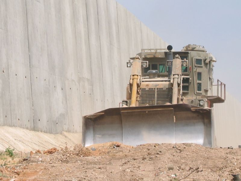Militarised Caterpillar D9 by the West Bank barrier 2006 joeskillet