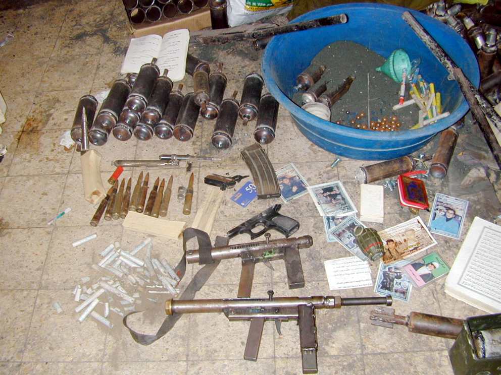 Weapons and explosives found in a terrorist lab during the battle of Jenin 09 04 2002 Yonathan Neeman